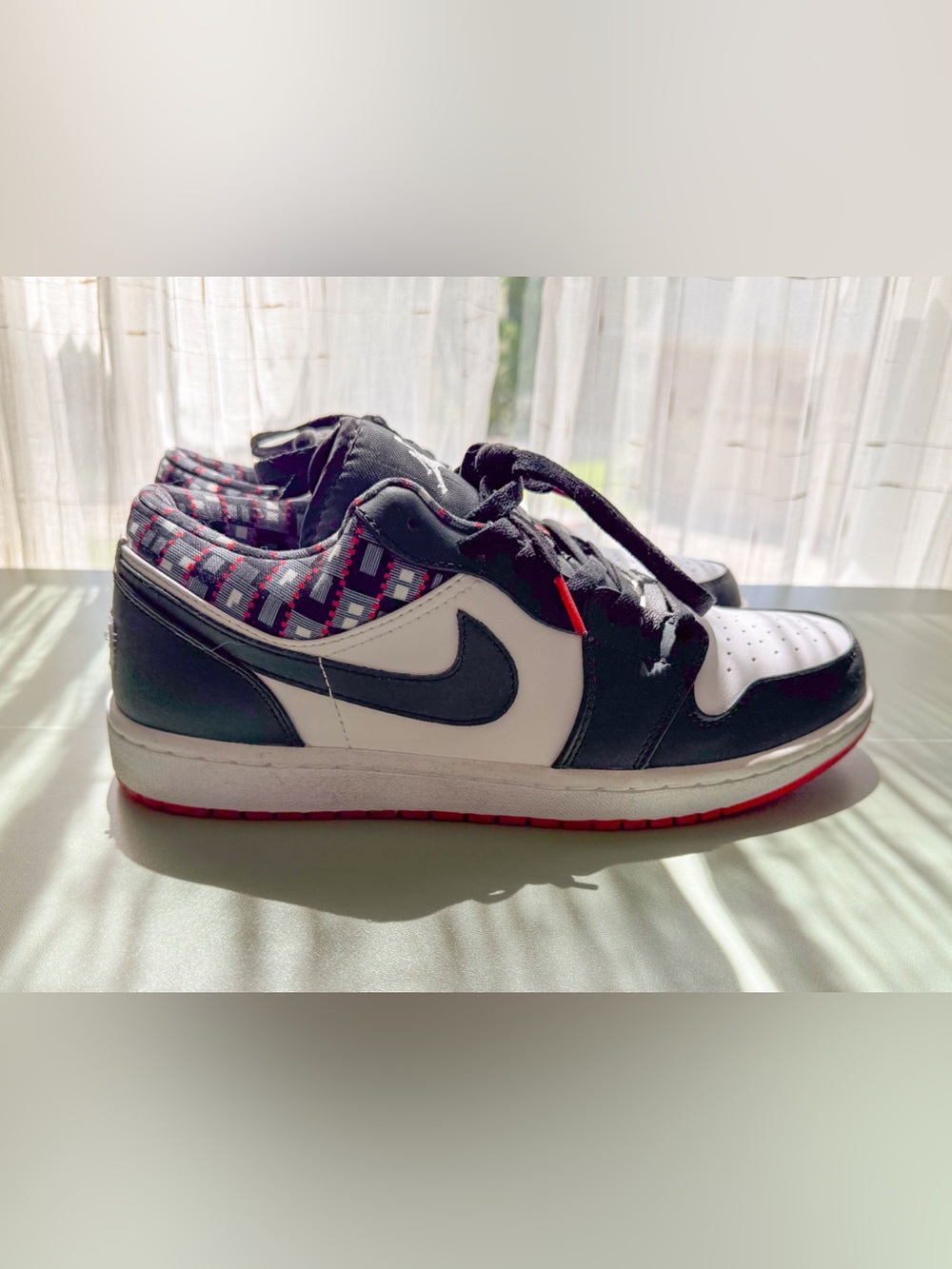 Nike Jordan 1 Low-Top Sneaker in Black, White & Red Accent